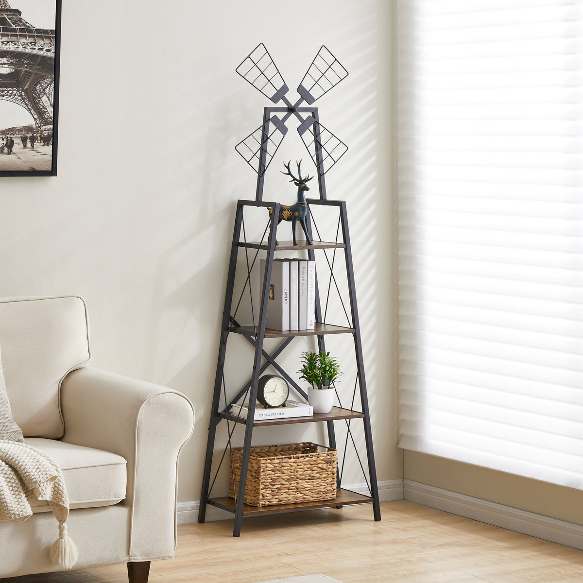 Narrow bookshelf with four brown shelves, a black frame, and decorative windmill top beside an armchair and window.