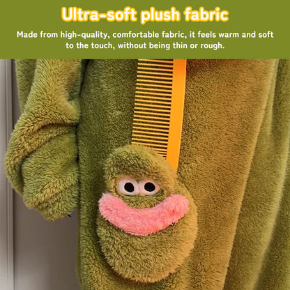 Close-up of the soft green plush fabric, sleeve, and character front pocket on the fish onesie pajamas.