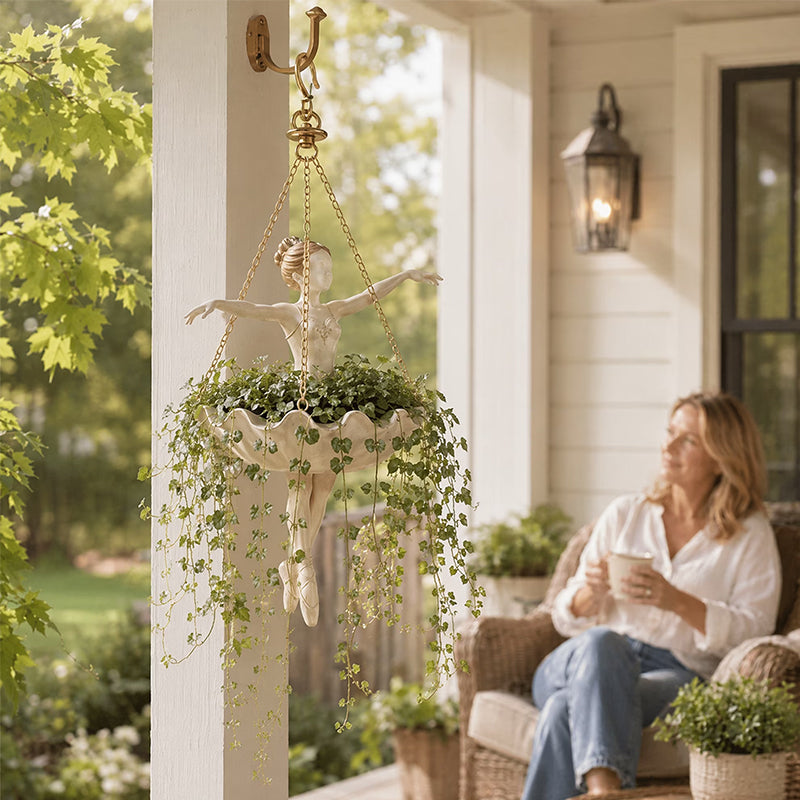 Ballerina hanging resin planter with trailing greenery displayed on a covered porch