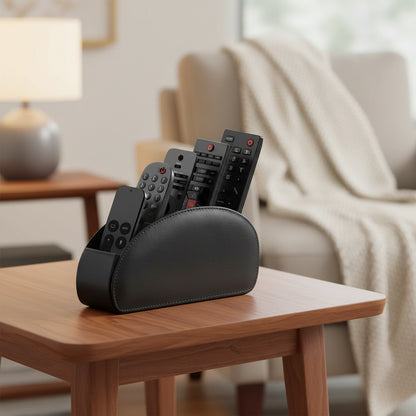 Black remote control organizer holding multiple TV and streaming remotes on a white background