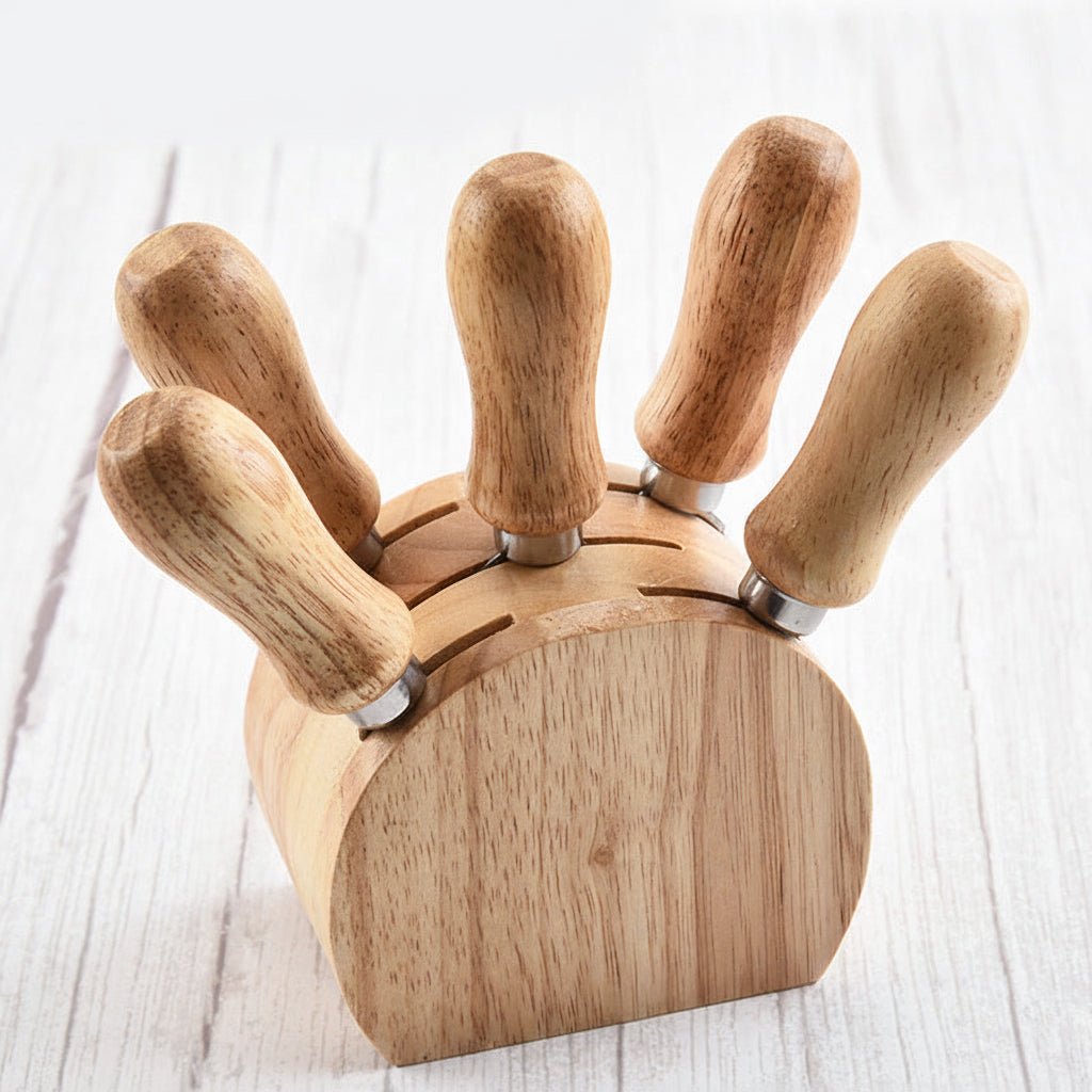Stainless steel cheese knives displayed upright in a round rubberwood storage holder
