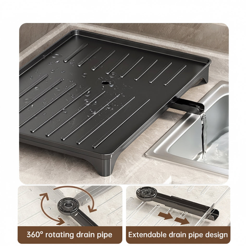 Black dish rack drainboard with an extendable 360-degree rotating drain spout directing water into a sink