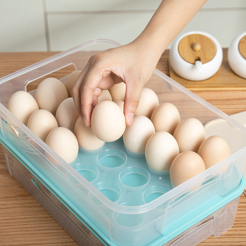 A hand lifting an egg from an open storage box with individual egg compartments.