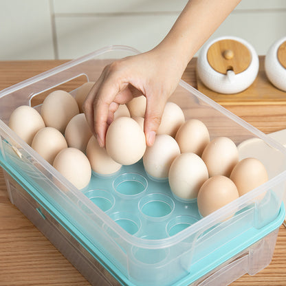A hand lifting an egg from an open storage box with individual egg compartments.
