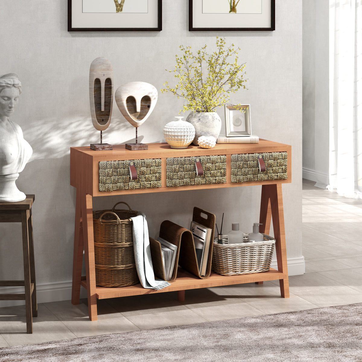 Brown entryway console table with three woven drawers and baskets on the open lower shelf