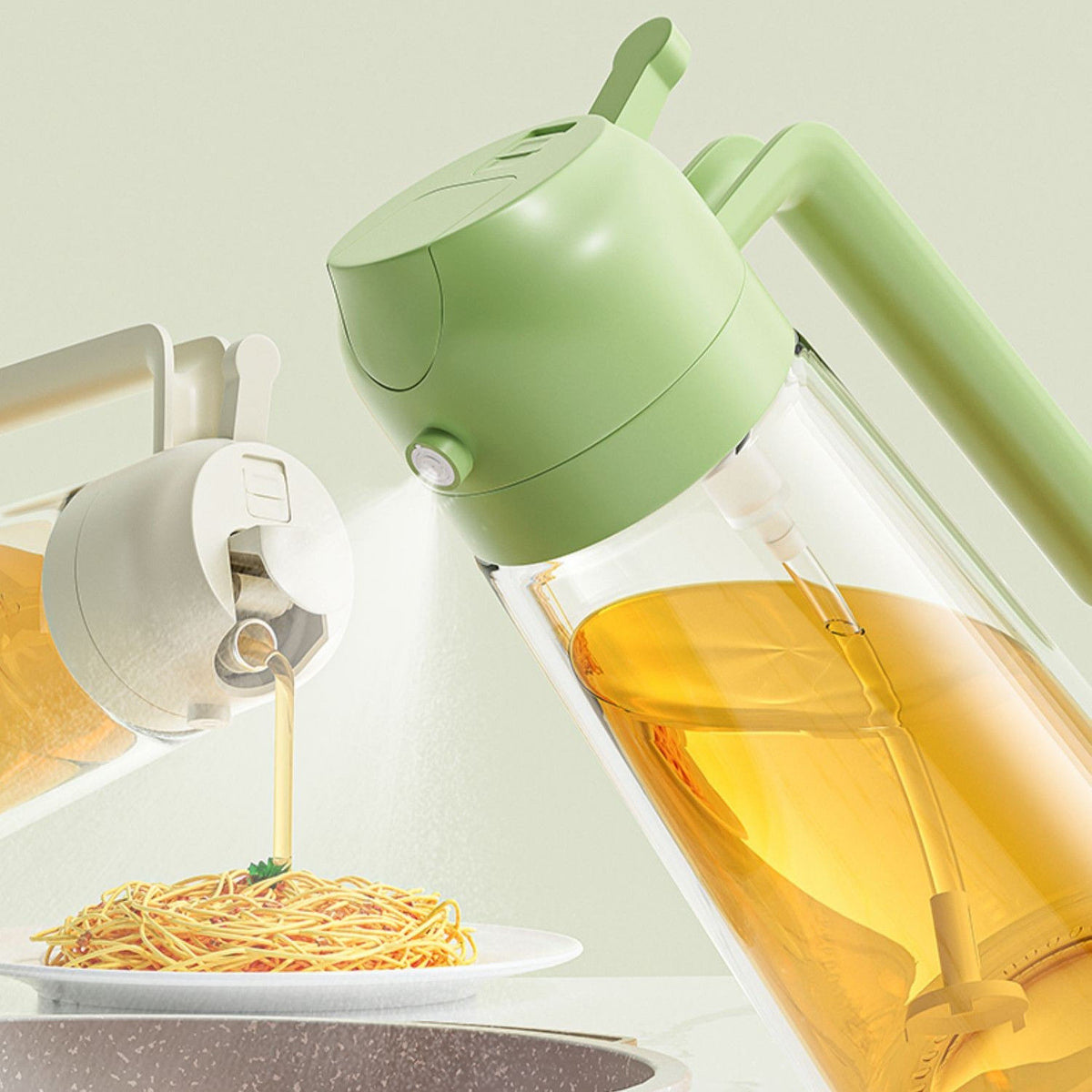 Green and white glass oil dispenser and mister bottles being sprayed and poured over spaghetti