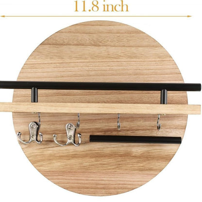 Light brown round wooden wall shelf with metal rails and hooks measuring 11.8 inches wide